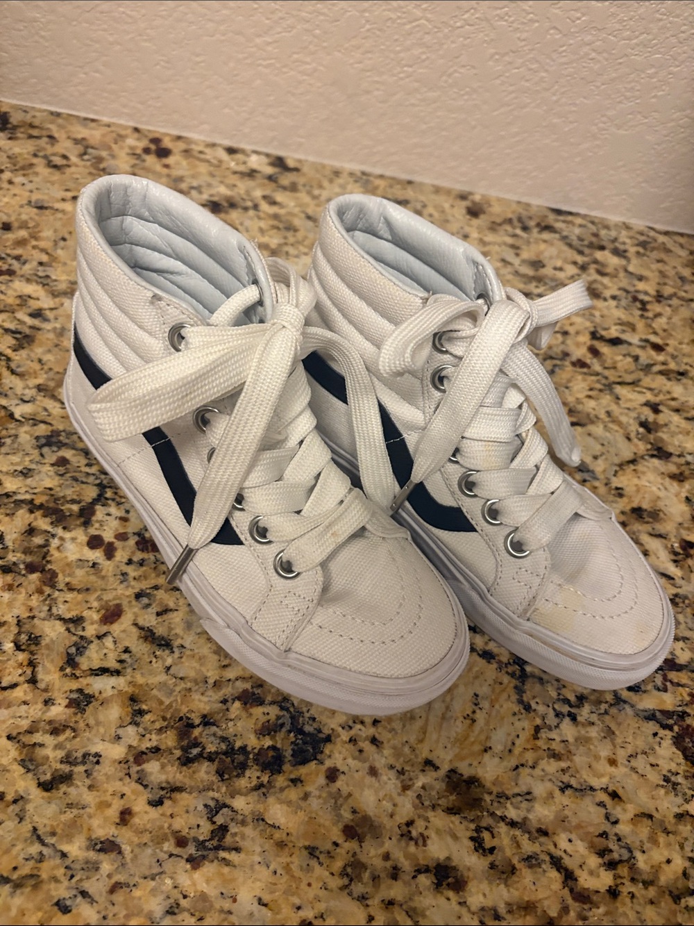 White High-Top Kids Sneakers with Black Side Stripe. VANS